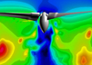 CFD of concurrent visualization of vorticity magnitude on a cutting plane for the V-22 Osprey rotor in hover